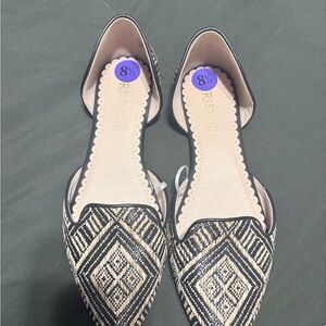 Restricted Black and Tan Patterned Flats